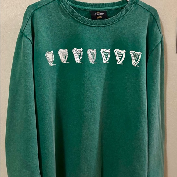 Guinness Tops - Celebrate St. Patrick’s Day! Guinness Sweatshirt with “Evolution of the Harp”.